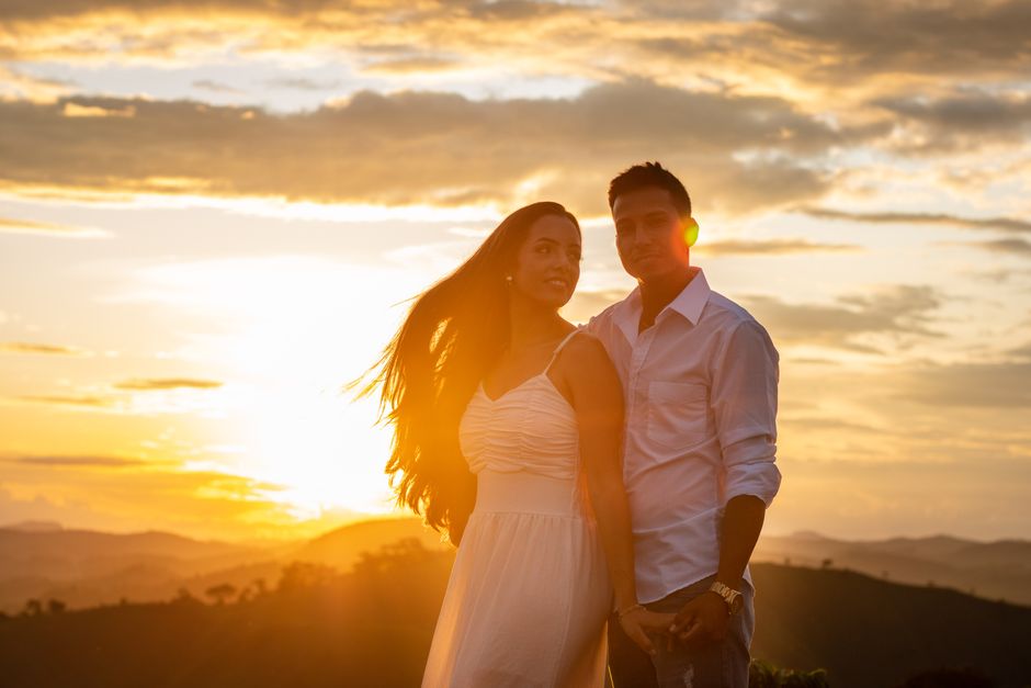 Couple portrait outdoors at golden hour